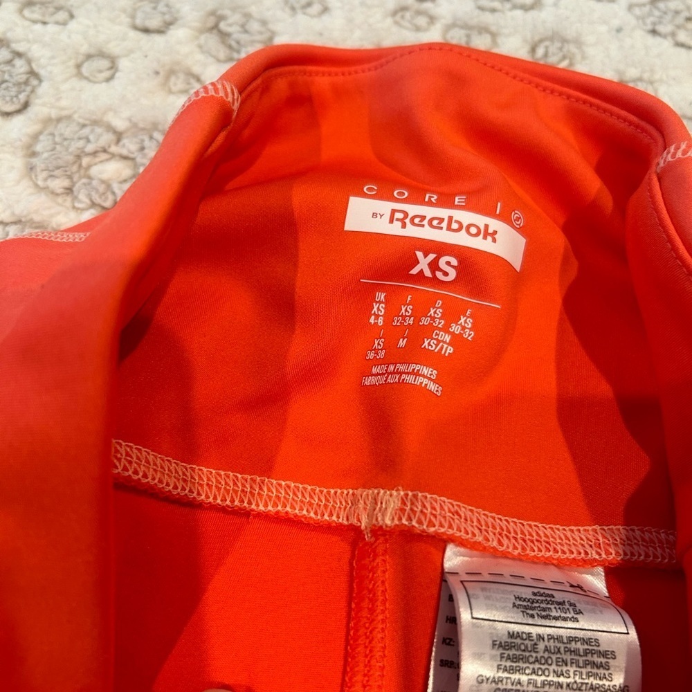 NWT Reebok Size XS Core IO Orange Rave Running Tights - Picture 3 of 5